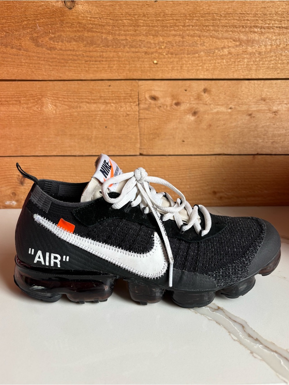 Nike Men’s Black/White with Orange Accent 'Air' Flyknit Sneaker
